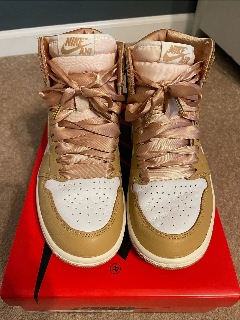 Retro Jordan 1 Nike Women’s High-Top Sneakers in White and Praline Rose Gold